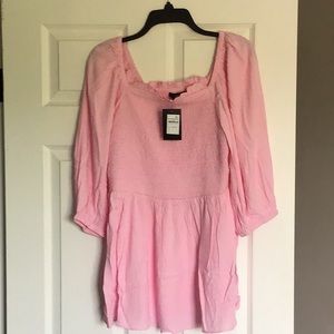 Torrid Pink peplum top.